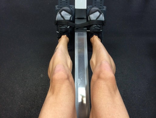 feet put into straps of the footpads
