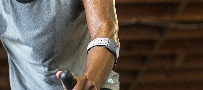 a person wearing heart rate monitor armband