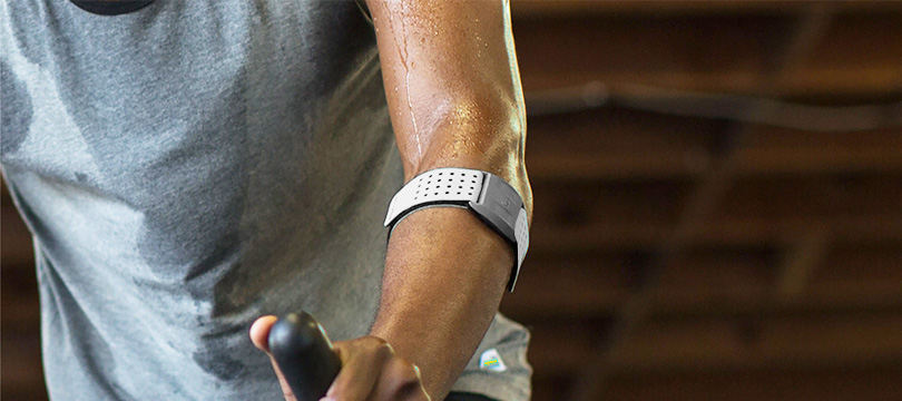a person wearing heart rate monitor armband