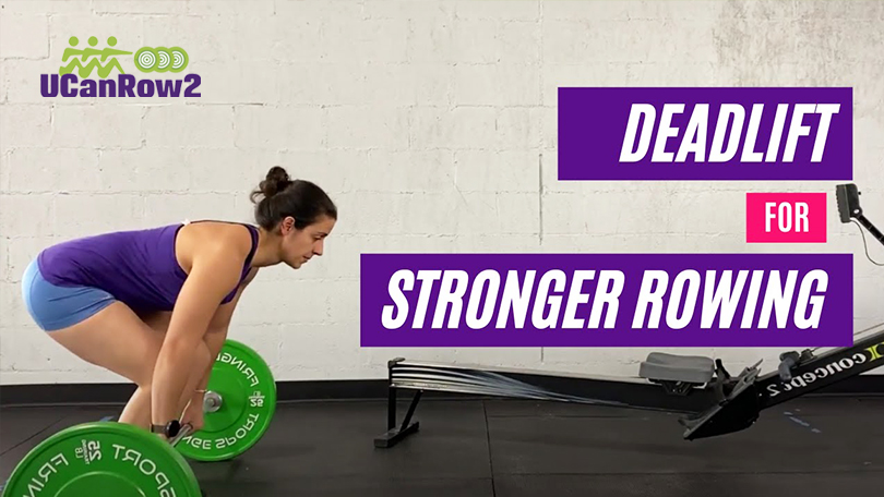 a woman lifts up a barbell beside an indoor rowing machine